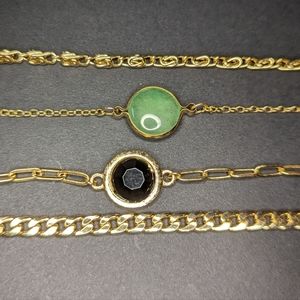 Four piece bracelet set.